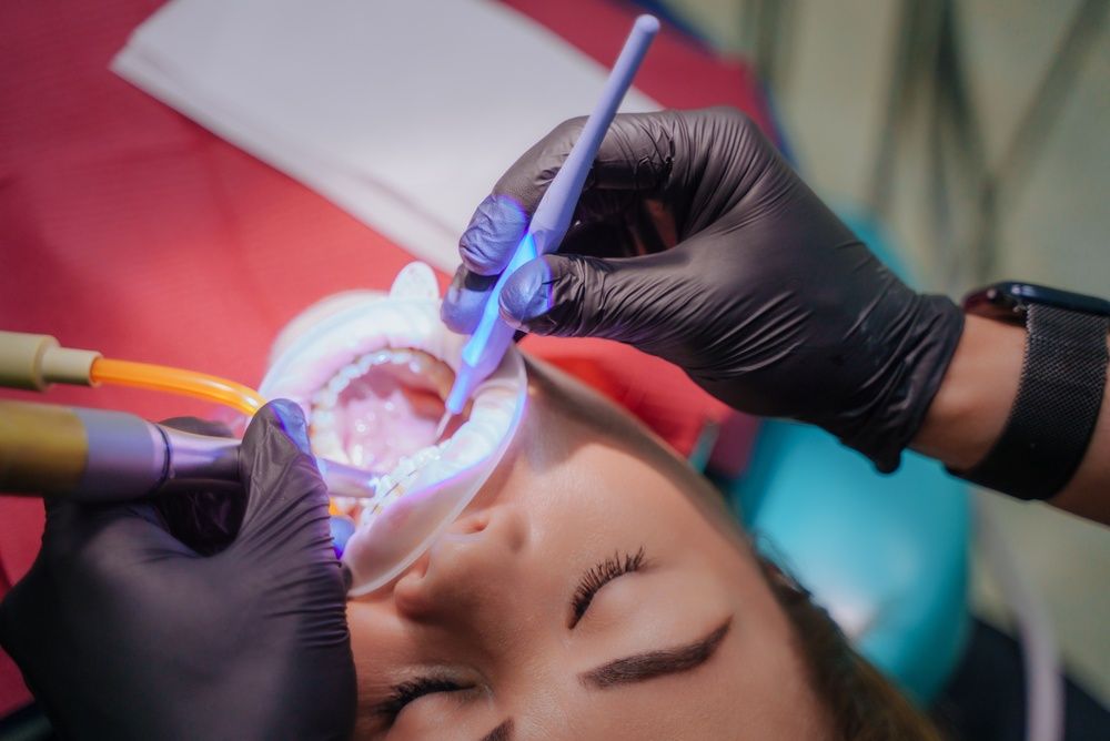 Sedation Dentistry. dentist administers anesthesia to the patient